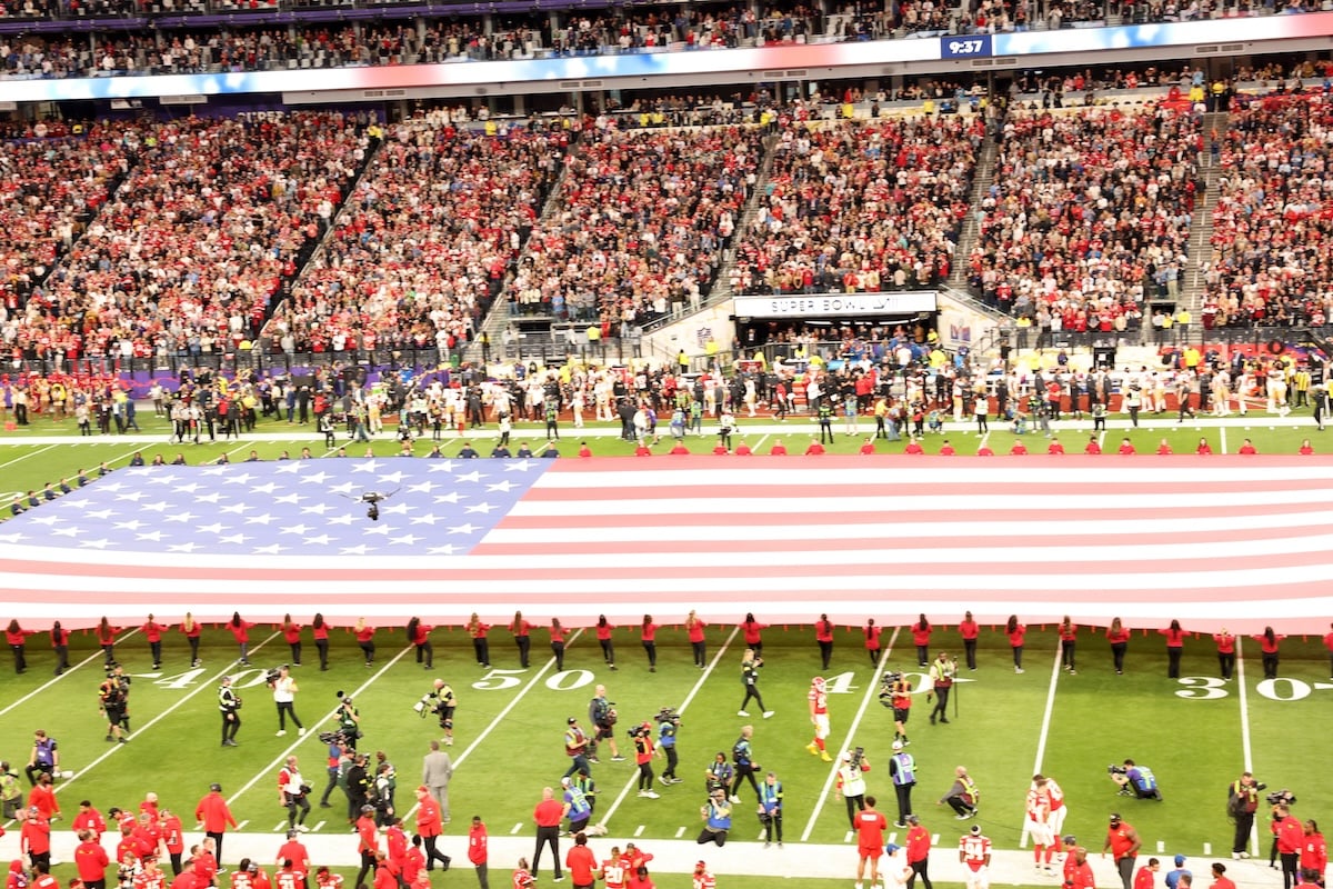 the flag taking over the football field at the Super Bowl