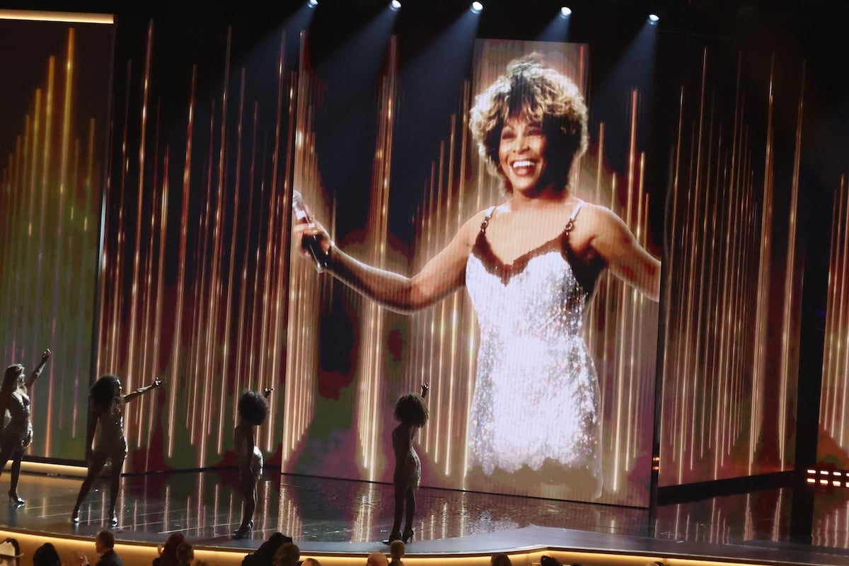 Tina Turner being projected on a stage for her memorial performance at the Grammys