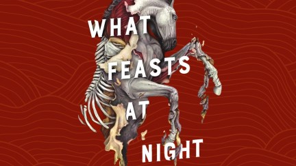 The cover of What Feasts at Night over a red, vaguely fungal background