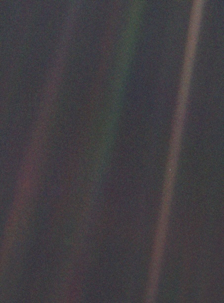 Three faint bands of light against a black background. A tiny blue dot is visible halfway up the band to the right.