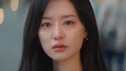 Kim Ji-won starring as Hong Hae-in with a tearful look on her face in Queen of Tears