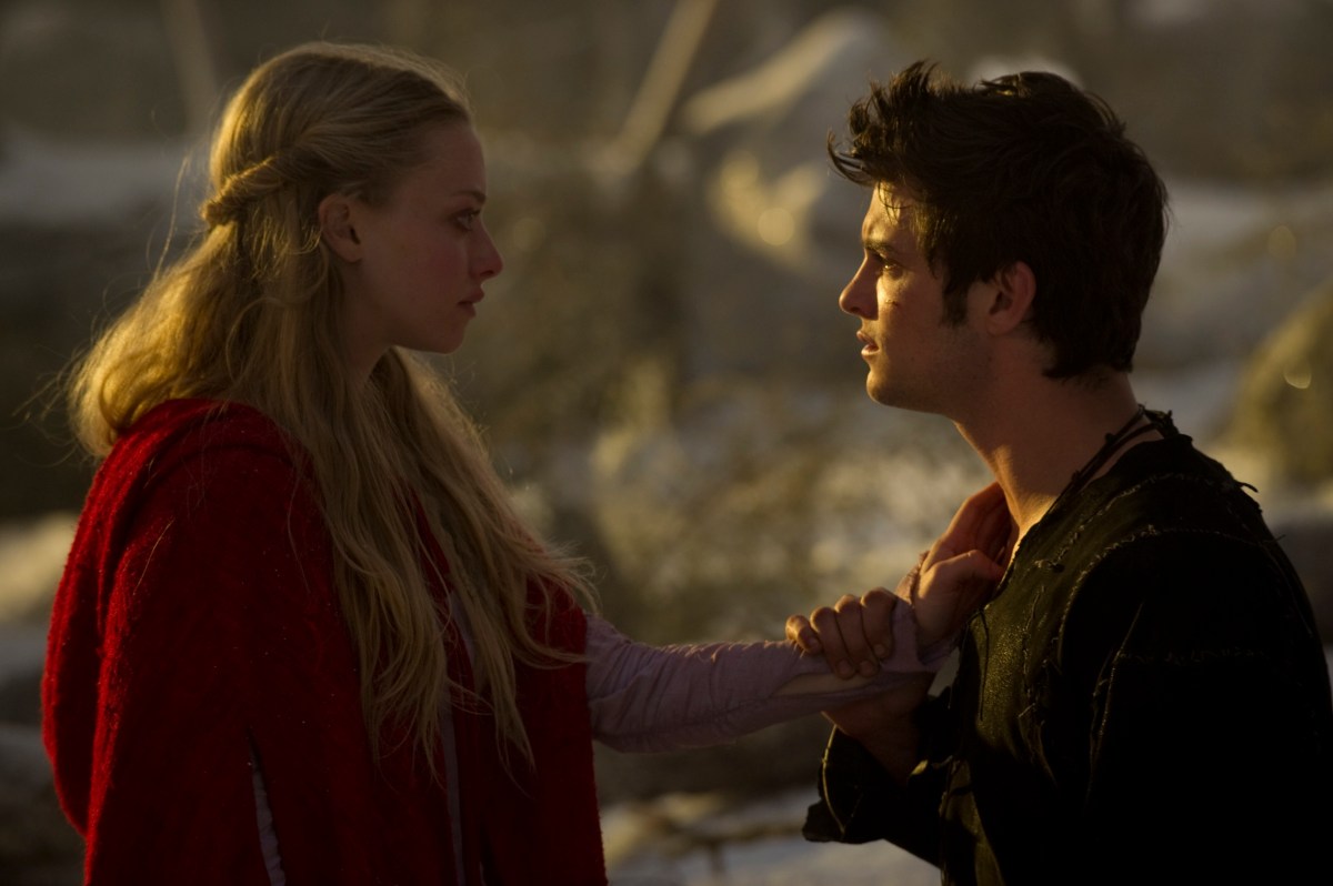 Amanda Seyfried and Billy Burke gazing at each other in Red Riding Hood