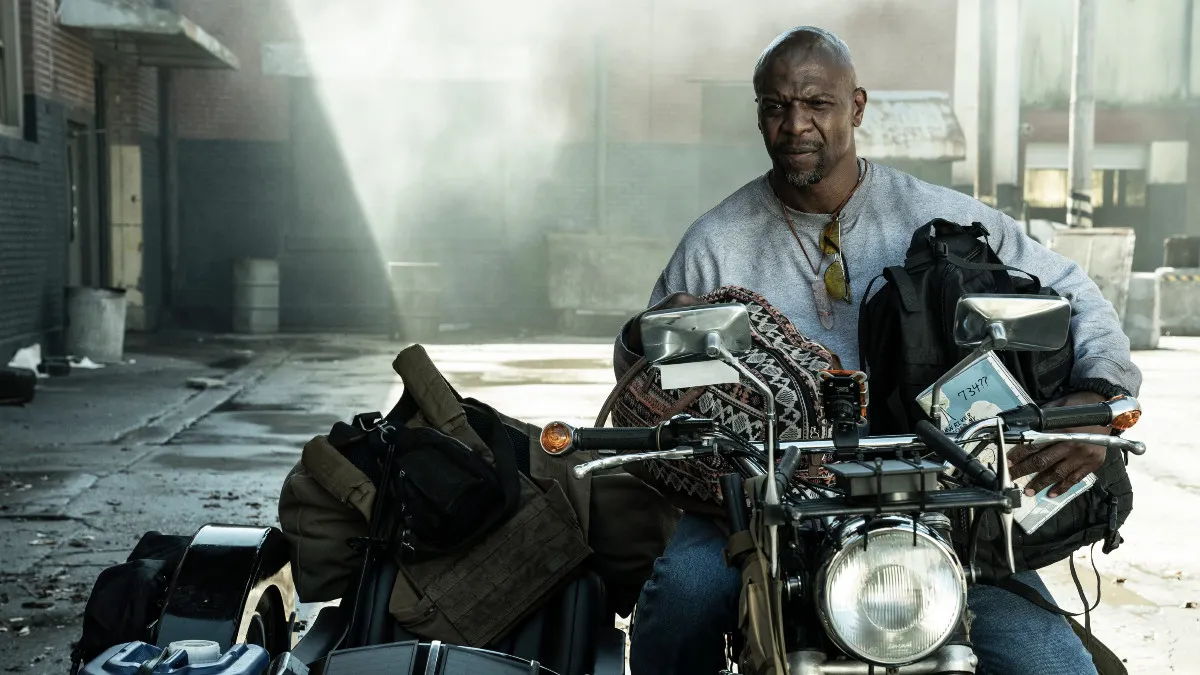 Terry Crews sitting on a motorcycle in Tales of the Walking Dead 