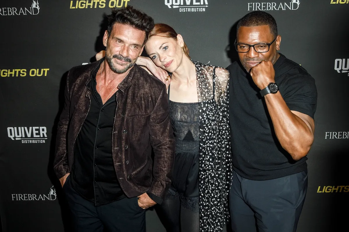 Frank Grillo posing with Jamie King leaning on him and Mekhi Pfeiffer punching himself in the face