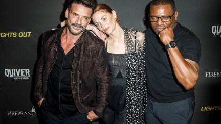 Frank Grillo posing with Jamie King leaning on him and Mekhi Pfeiffer punching himself in the face