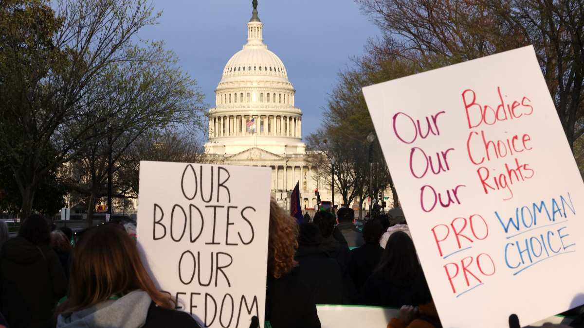 Women protest outside the U.S. Capitol as the Supreme Court considers banning Mifepristone