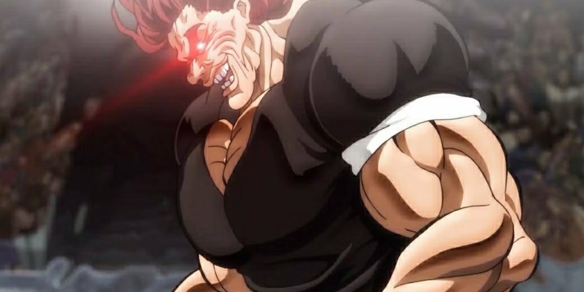 Yujiro Hanma flexes his muscles with glowing red eyes in "Baki"