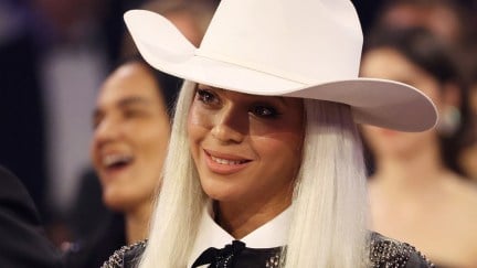 Beyoncé sitting in a cowboy hat at an award show