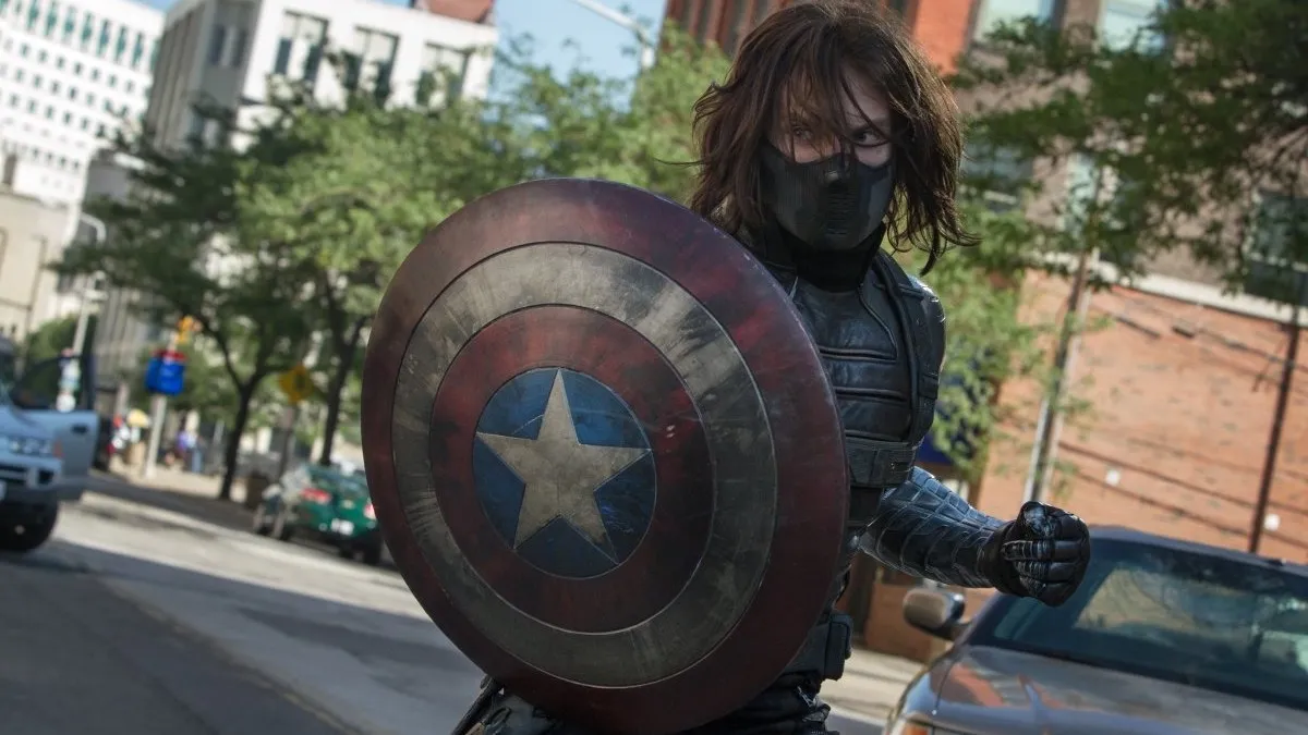 Bucky holds Captain America's shield in a scene from 'Captain America: The Winter Soldier'