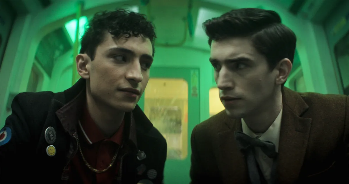 Charles and Edwin look at each other in Dead Boy Detectives.