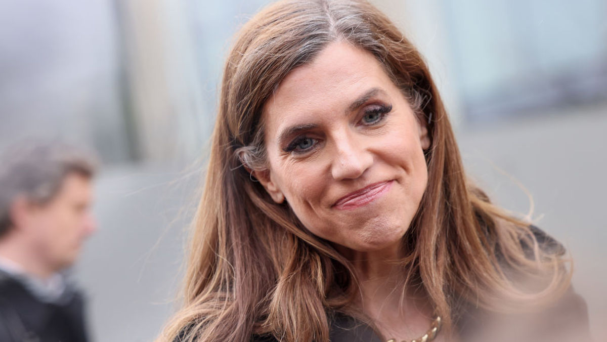 Nancy Mace gives a tight-lipped smile.