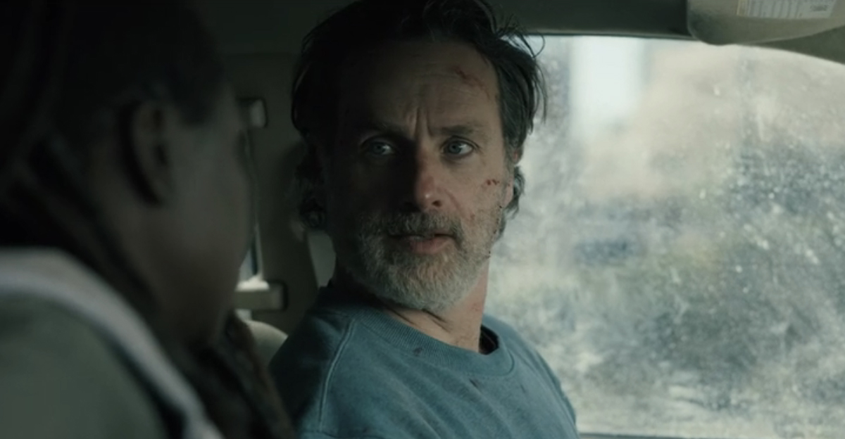 Rick Grimes looking at Michonne in a car he cannot drive