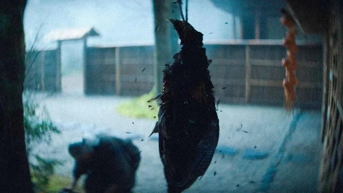 A hanging pheasant attracts flies as it rots in Shōgun episode 5, "Broken to the Fist."