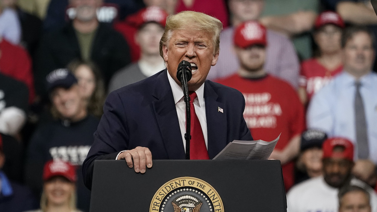 Donald Trump yells during a political rally