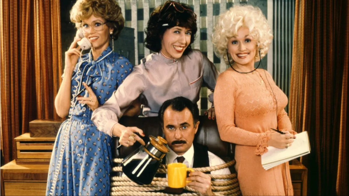Jane Fonda, Lily Tomlin, and Dolly Parton have Dabney Coleman tied up in '9 to 5'.