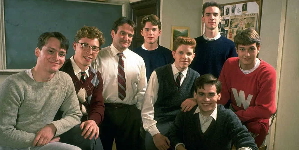 The entire cast of Dead Poets Society, including Robin Williams as Professor Keating, Ethan Hawke as Todd Anderson and Josh Charles as Knox Overstreet