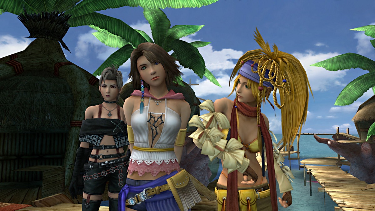 Three women stand on a tropical beach in "Final Fantasy X-2" 