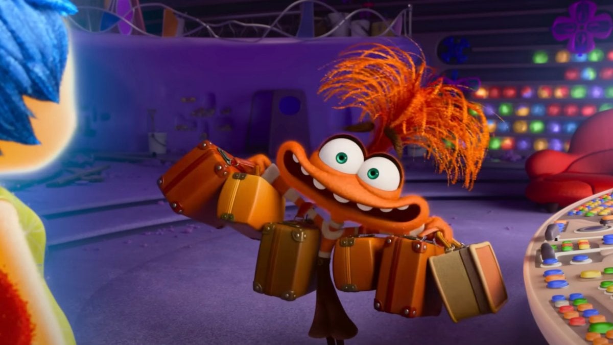 Anxiety holding suitcases in Inside Out 2