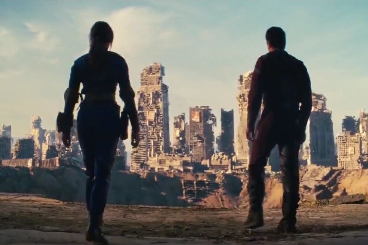 Image of the silhouettes of Lucy and Maximus overlooking the ruins of Shady Sands in a scene from Prime Video's 'Fallout." 