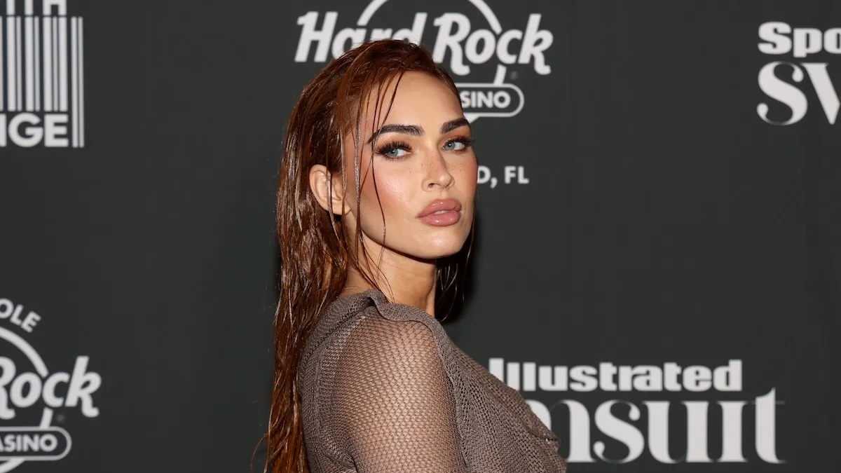 Megan Fox on a red carpet.