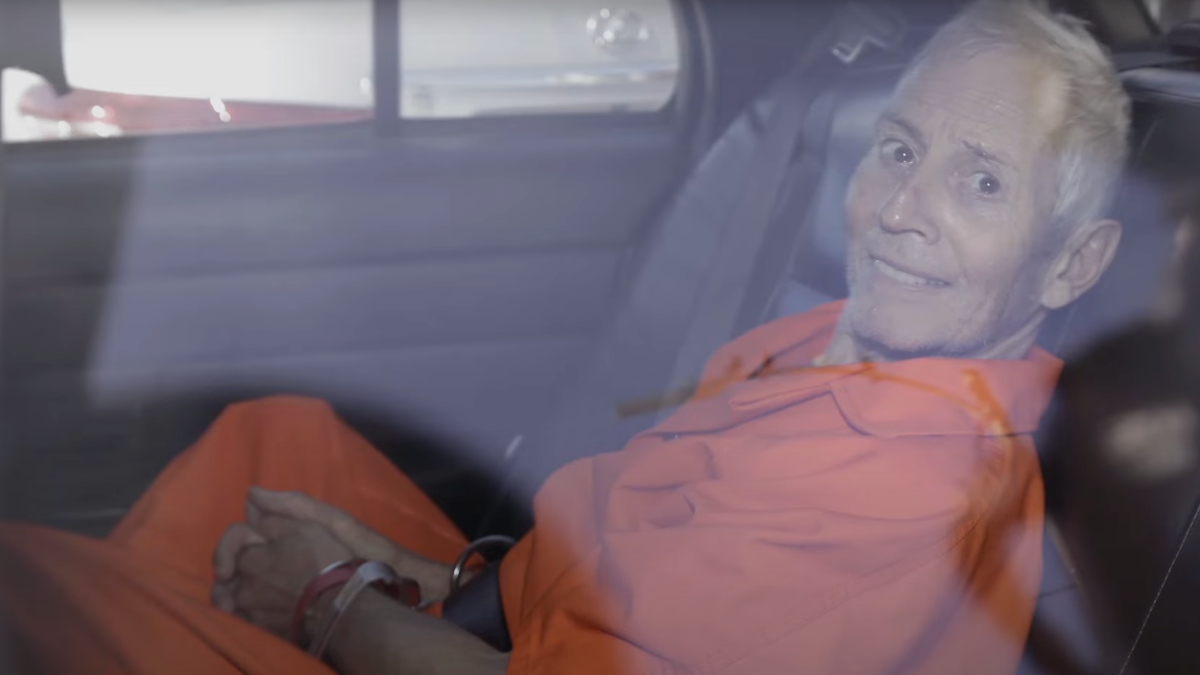 Robert Durst is detained in the back of a police car in footage from 'The Jinx Part Two'