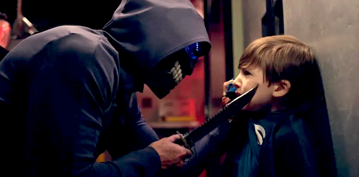 Someone in a mask holding a child at knifepoint in Stream.