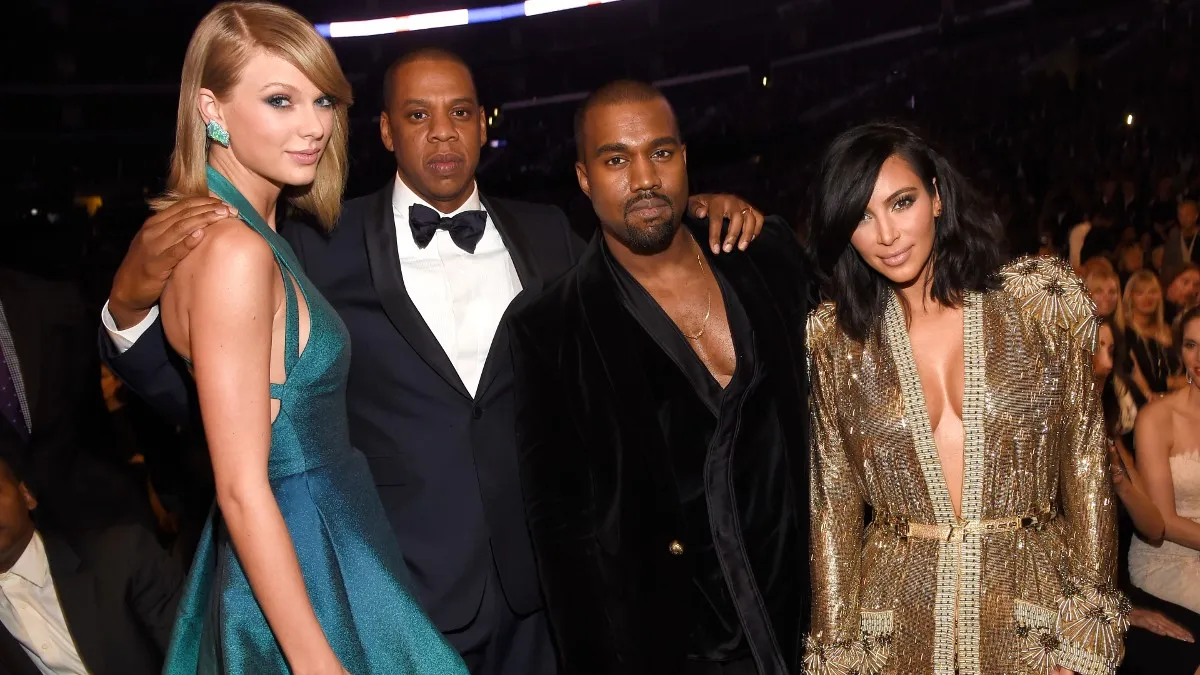Taylor Swift, Jay-Z, Kanye West, and Kim Kardashian pose at the 57th Grammy Awards