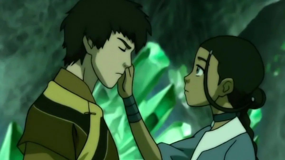 Katara touches Zuko's face in a room full of glowing crystals in "Avatar" 