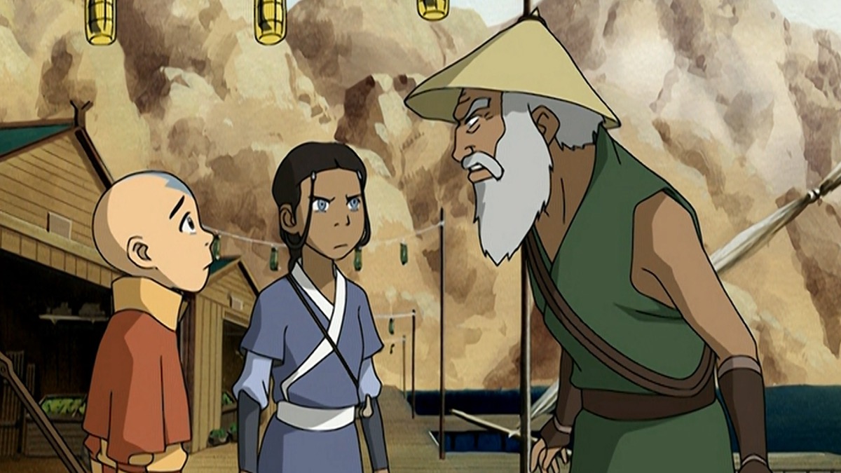 An old man frowns at a timid Aang while Katara looks on angrily in "Avatar"