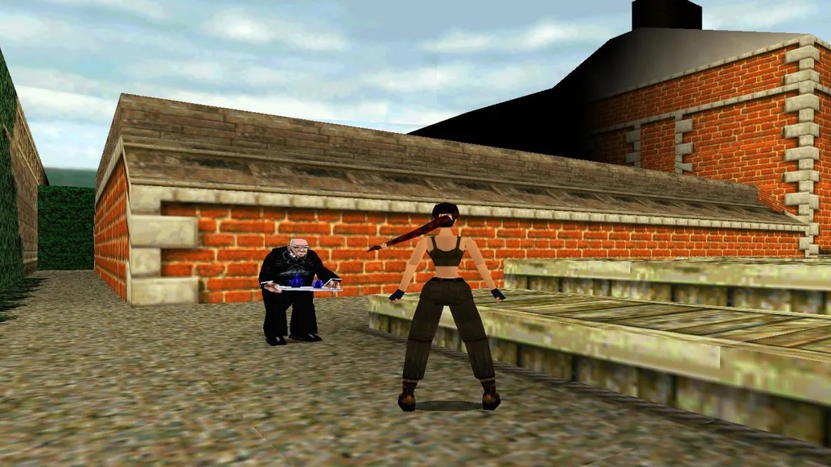 Lara Croft stands among brick buildings in "Tomb Raider 2" 