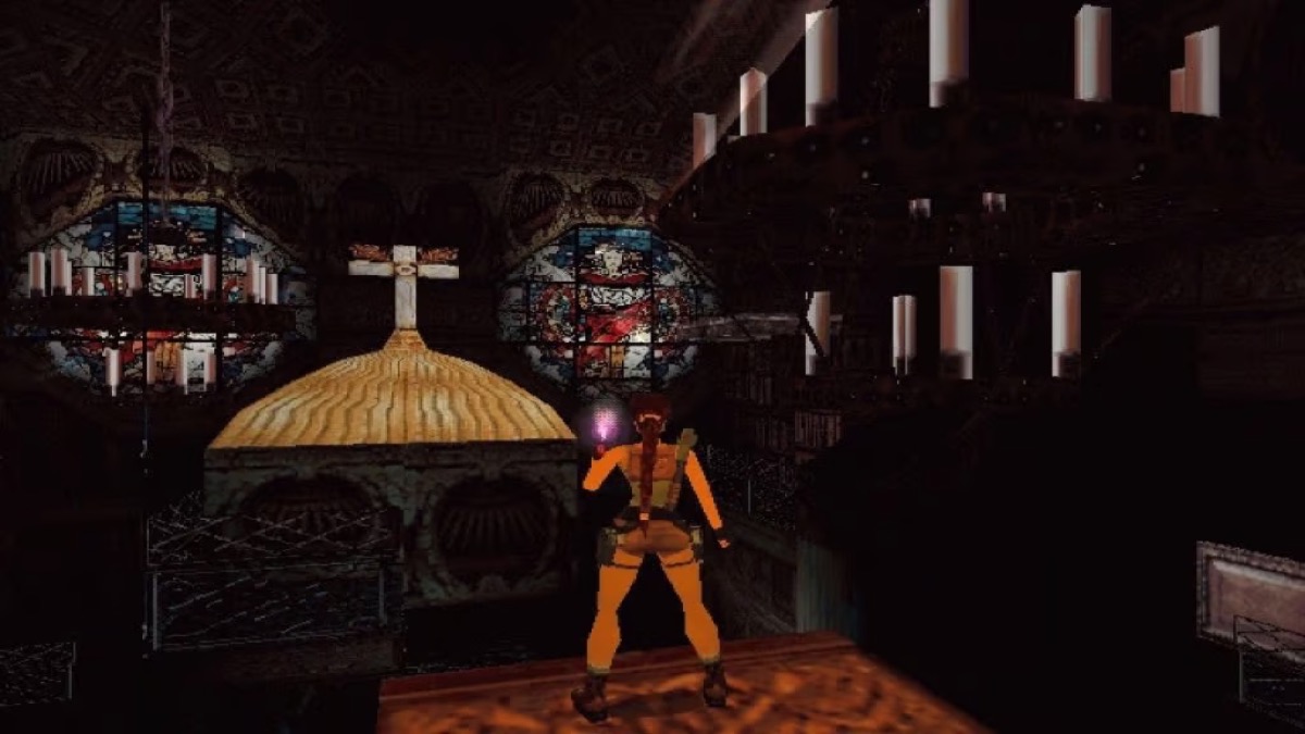 Lara Croft stands in a dark church in "Tomb Raider 3" 
