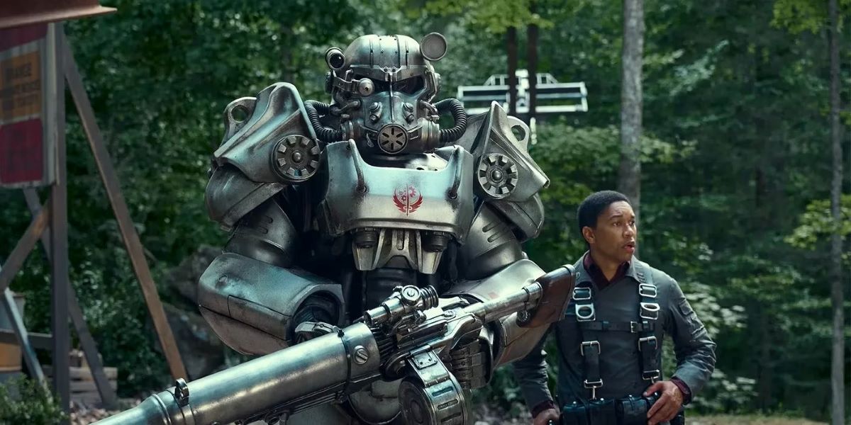 Maximus (Aaron Moten) standing next to a suit of armor in 'Fallout'