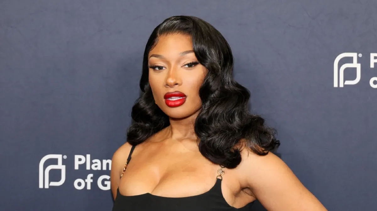 Megan Thee Stallion poses for pictures at a Planned Parenthood event.