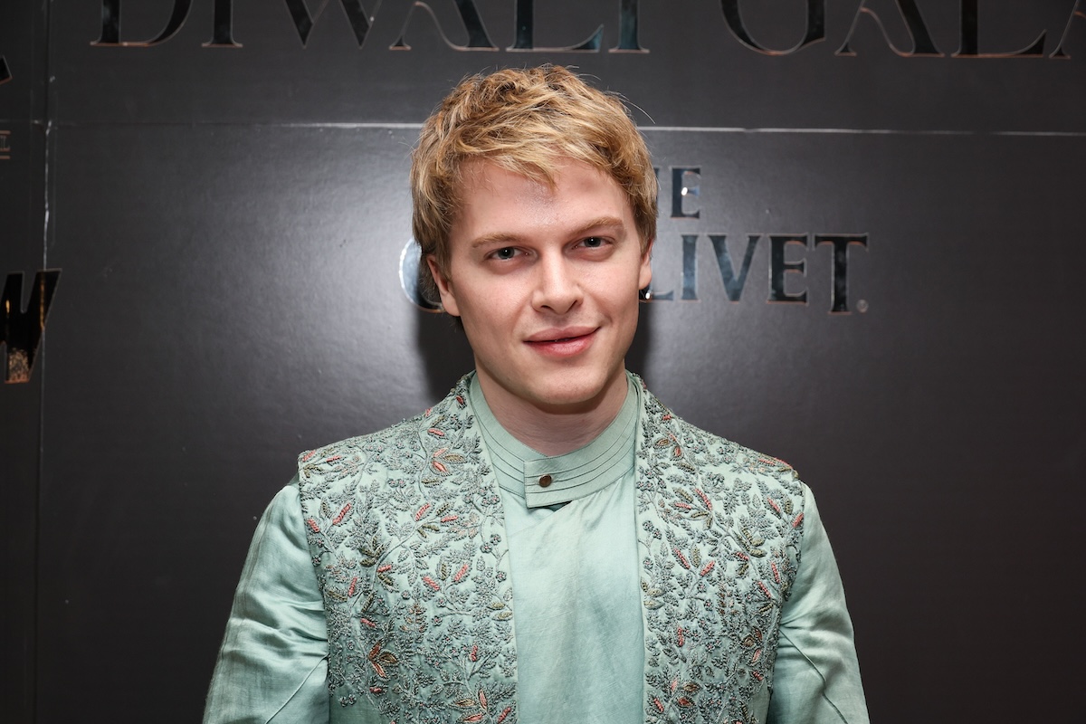 Ronan Farrow standing on a red carpet