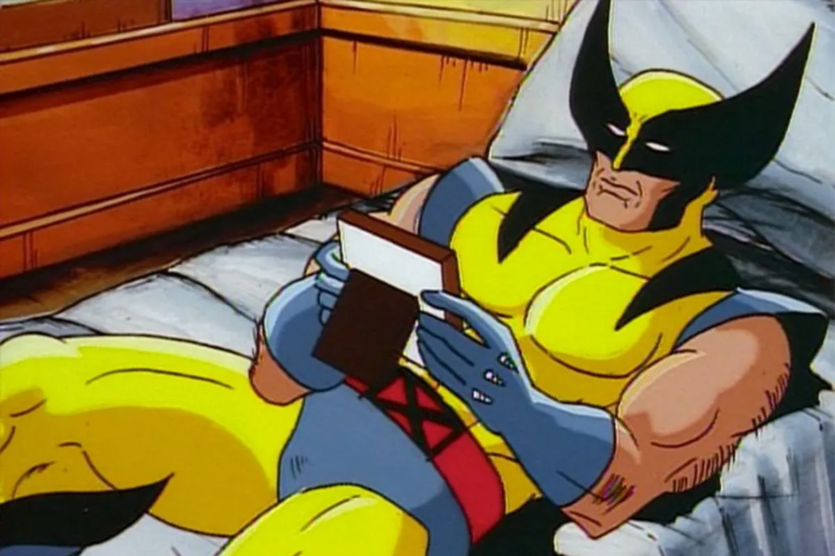 wolverine staring at a picture frame longingly in the comics