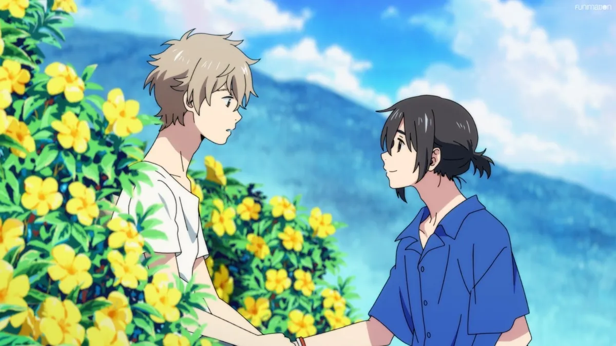 Two boys talk in a flower patch in "Stranger By The Shore"