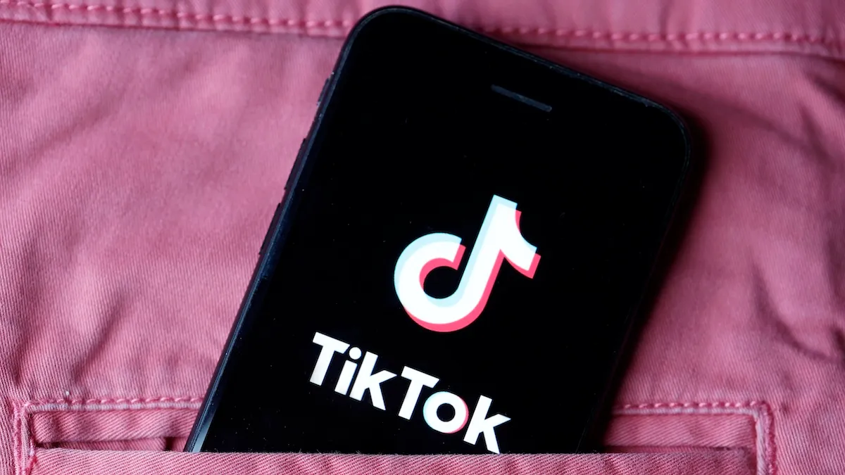 phone in pocket with tiktok