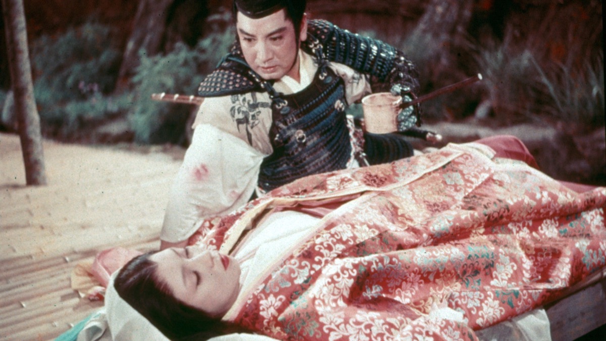 A samurai peers down at a sleeping woman in "Gate of Hell"
