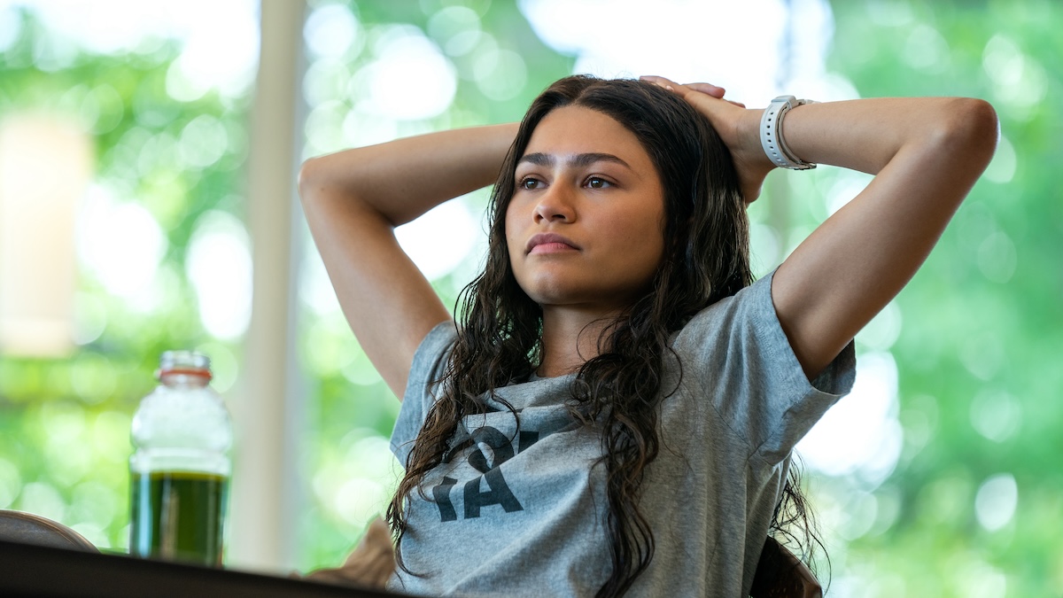 Zendaya wearing a shirt that says 'I told ya'