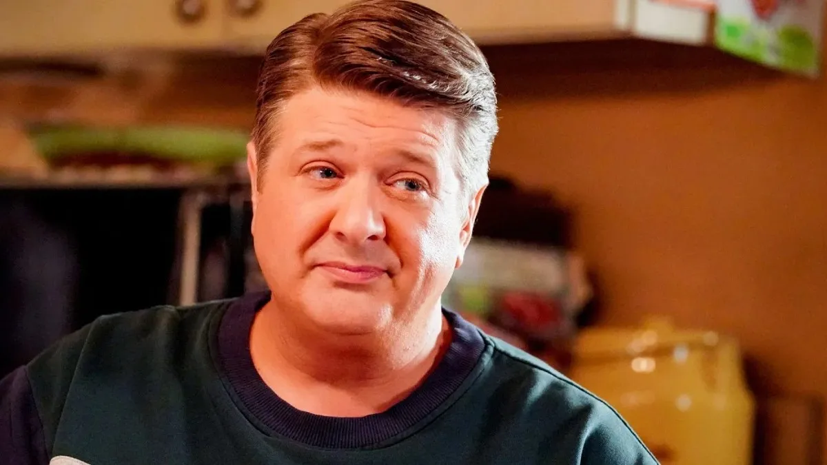 Lance Barber as George Cooper in Young Sheldon
