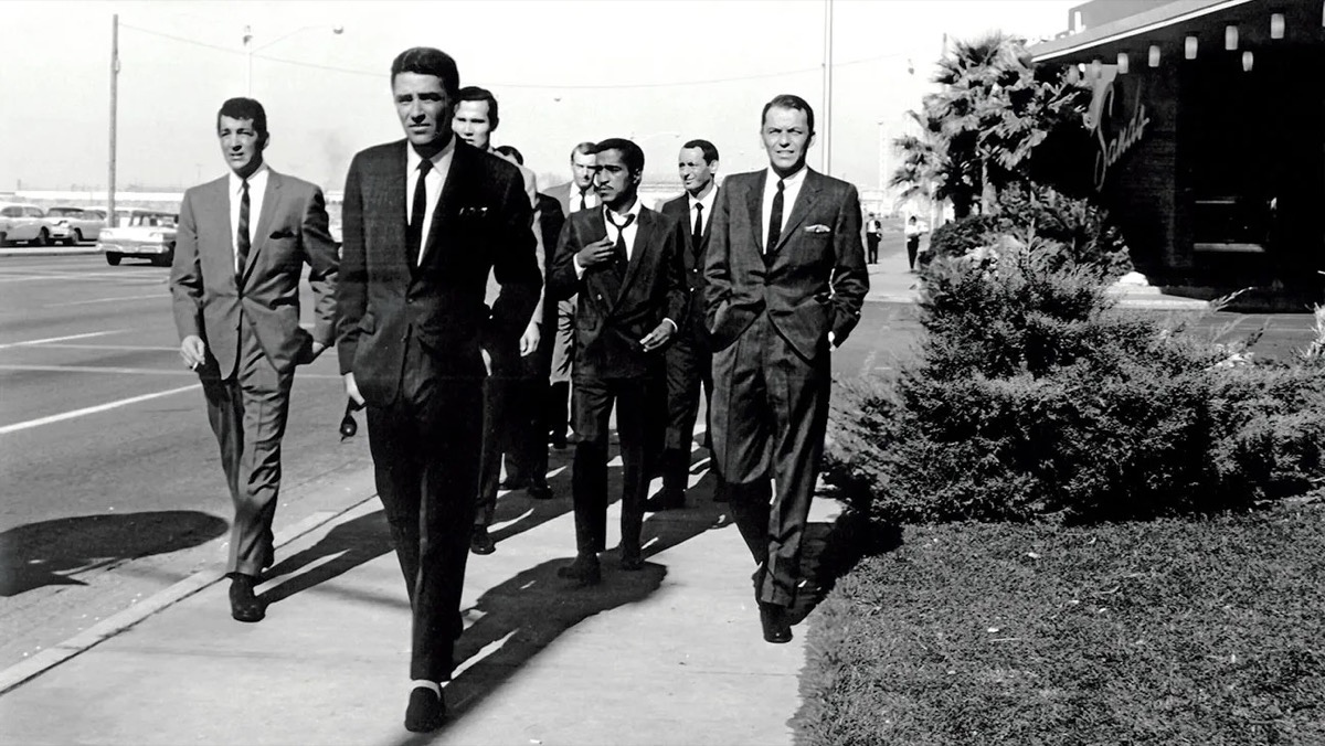 Men in suits walk down the street in "Ocean's 11"