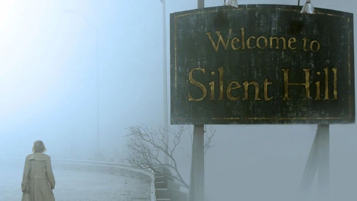 'Silent Hill': A woman approaches a foggy town. A sign reads "Welcome to Silent Hill."