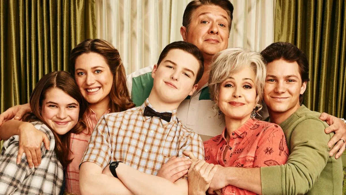 The Cooper Family poses for a Young Sheldon promo