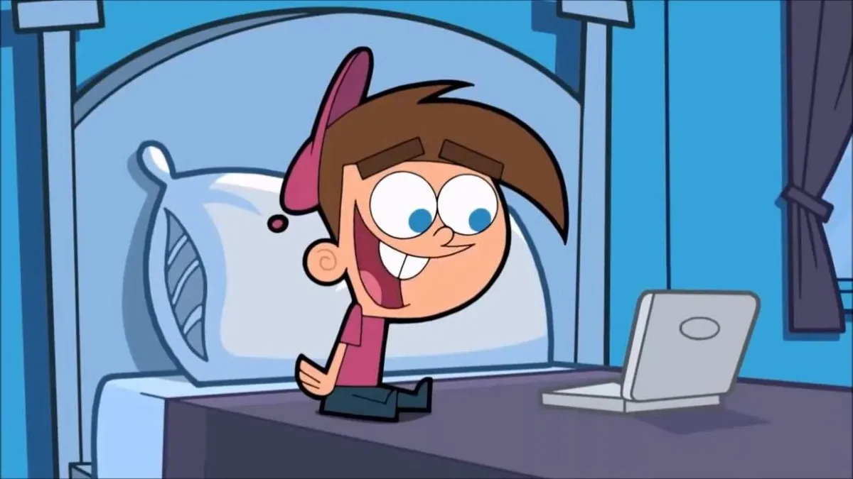 Timmy Turner looking at a laptop in The Fairly OddParents