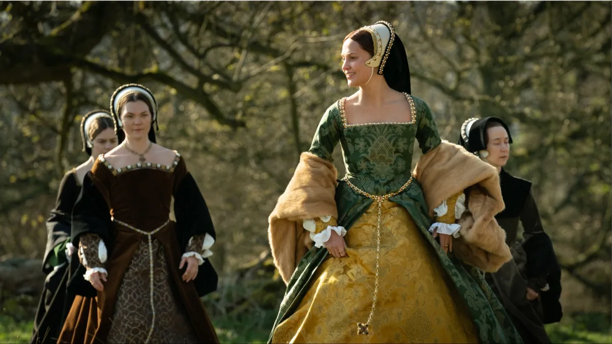 Queen Catherine Parr (Alicia Vikander) walks with her ladies in waiting in 'Firebrand'.