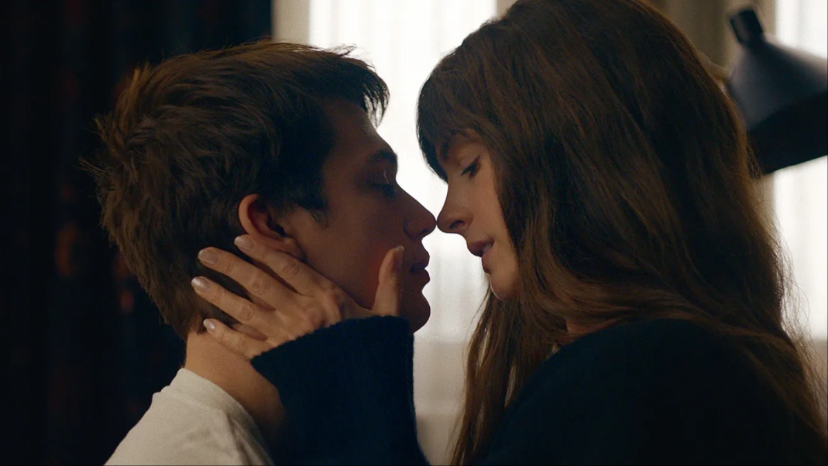 Nicholas Galitzine and Anne Hathaway almost kiss in 'The Idea of You'.