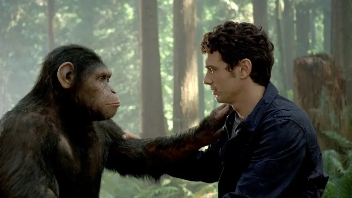 Caesar the chimpanzee and James Franco hug in 'Rise of the Planet of the Apes'.