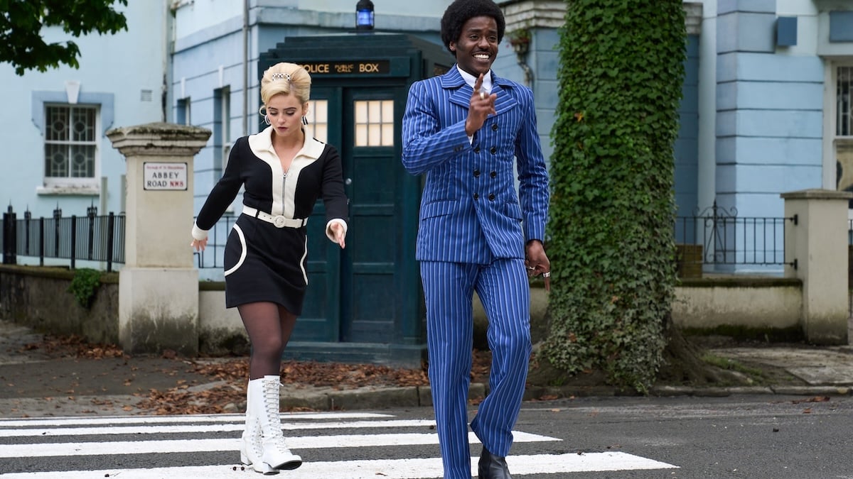 ruby and the doctor walking on abbey road in front of the tardis