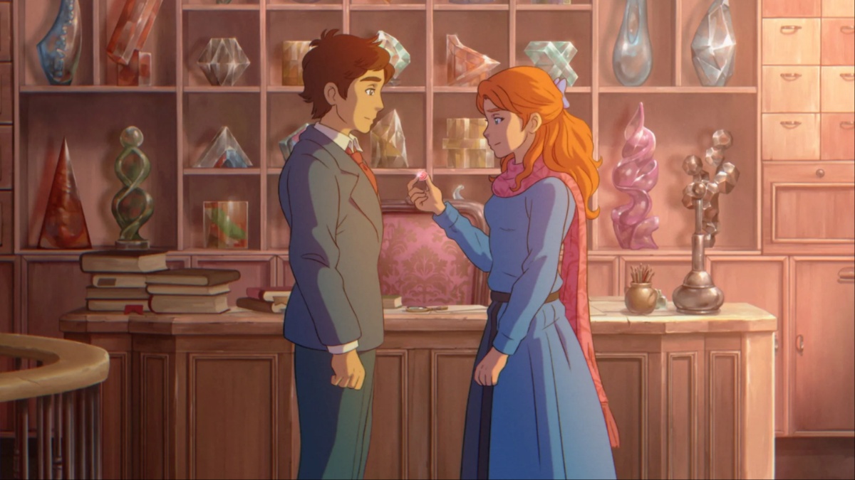 A man and a woman stand in a glass shop in this still from 'The Glassworker'.