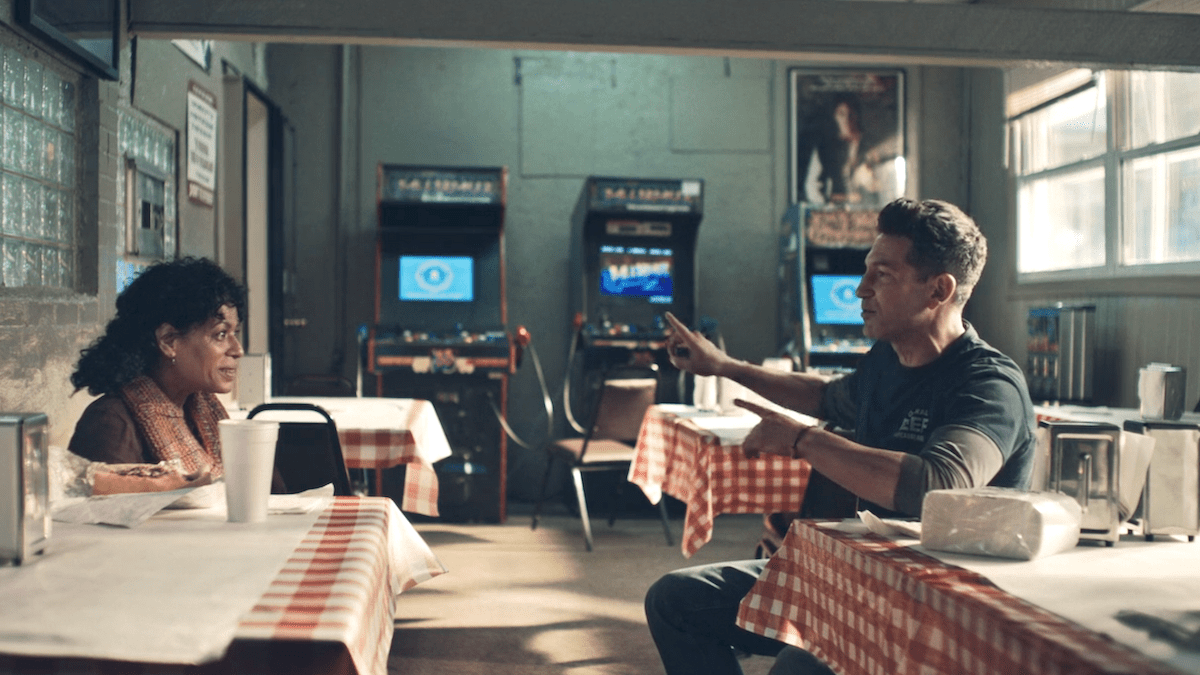 mikey and tina sitting at tables in the beef